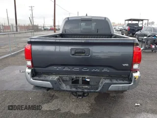2022 Toyota Tacoma SR5 with VIN 3TMBZ5DN2NM034561, listed as a IAAI auction lot 40867443 with 51,728 mi miles and . Bid and sale history available at DreamBid. Image 16.