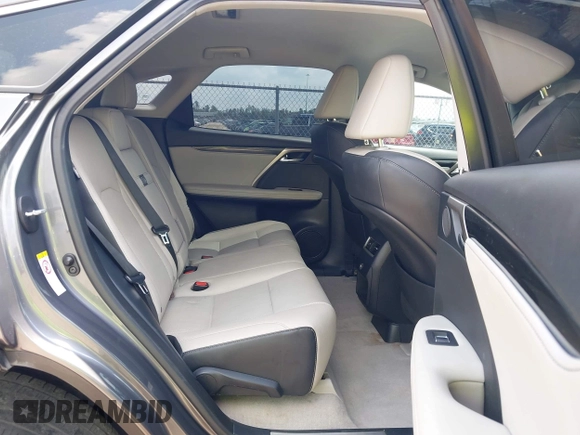 2016 Lexus RX 350 z VIN 2T2ZZMCAXGC031079, wystawiony jako IAAI lot #42120190 z przebiegiem 142 407 mil mil oraz . Historia ofert i sprzedaży dostępna na DreamBid. Obrazek 8.