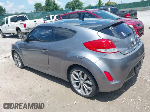 2012 Hyundai Veloster w/Black Int with VIN KMHTC6ADXCU061325, listed as a IAAI auction lot 42556398 with 122,954 mi miles and . Bid and sale history available at DreamBid. Image 3.