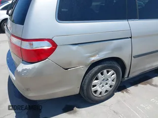 2007 Honda Odyssey LX z VIN 5FNRL38217B016001, wystawiony jako IAAI lot #42603816 z przebiegiem 209 630 mil mil oraz . Historia ofert i sprzedaży dostępna na DreamBid. Obrazek 6.