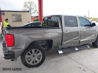 2017 Chevrolet Silverado 1500 High Country with VIN 3GCUKTEC2HG398853, listed as a IAAI auction lot 41969992 with 70,568 mi miles. Bid and sale history available at carsss.com. Image 6.