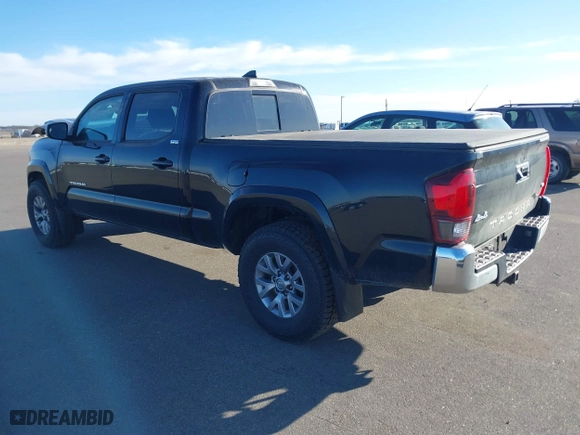 2019 Toyota Tacoma 4WD SR5 with VIN 3TMDZ5BN1KM060088, listed as a IAAI auction lot 41804525 with 69,893 mi miles. Bid and sale history available at carsss.com. Image 3.