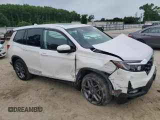 2023 Honda Passport EX-L z VIN 5FNYF8H51PB033343, wystawiony jako Copart lot #56594665 z przebiegiem 18 554 mil mil oraz Szkoda całkowita • Salvage title. Historia ofert i sprzedaży dostępna na DreamBid. Obrazek 4.