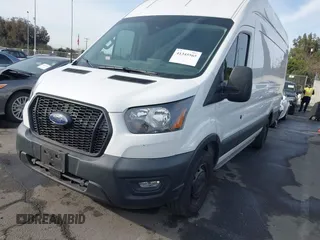 2021 Ford Transit Cargo with VIN 1FTBW3X82MKA19468, listed as a IAAI auction lot 41345565 with 67,485 mi miles. Bid and sale history available at carsss.com. Image 2.