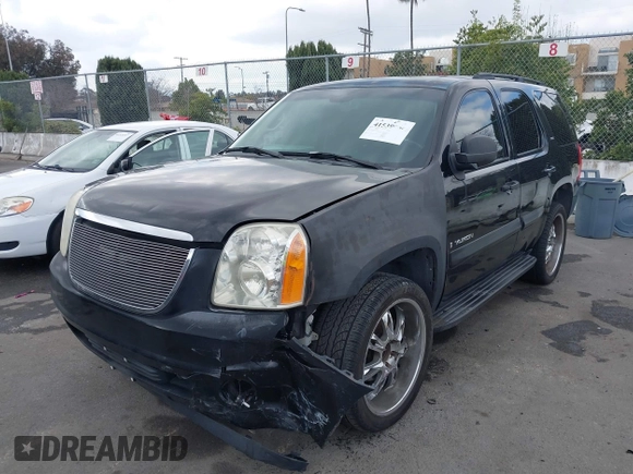 2008 GMC Yukon SLT w/4SB with VIN 1GKFC13078R161685, listed as a IAAI auction lot 41539964 with 267,744 mi miles. Bid and sale history available at carsss.com. Image 2.