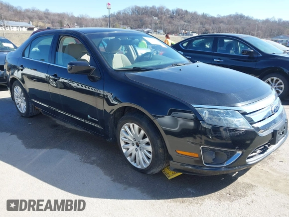 2010 Ford Fusion Hybrid z VIN 3FADP0L39AR396746, wystawiony jako IAAI lot #41764282 z przebiegiem 132 582 mil mil oraz . Historia ofert i sprzedaży dostępna na DreamBid. Obrazek 1.