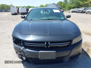 2015 Dodge Charger SE with VIN 2C3CDXBG9FH790573, listed as a IAAI auction lot 42142908 with 195,182 mi miles and . Bid and sale history available at carsss.com. Image 13.