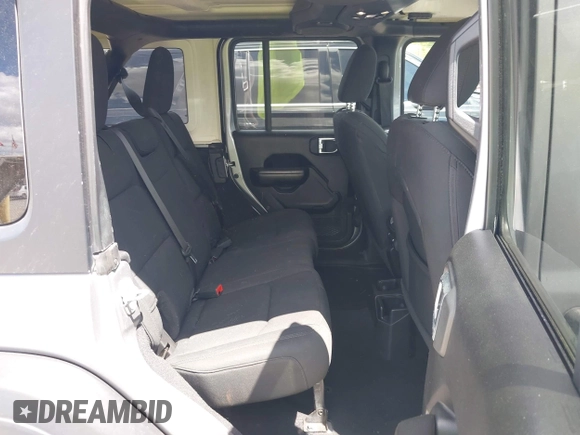 2021 Jeep Wrangler Unlimited Freedom z VIN 1C4HJXDN2MW544730, wystawiony jako IAAI lot #42624402 z przebiegiem 60 993 mil mil oraz . Historia ofert i sprzedaży dostępna na DreamBid. Obrazek 8.
