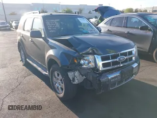 2009 Ford Escape Limited with VIN 1FMCU04749KD01103, listed as a IAAI auction lot 42078279 with 157,821 mi miles and . Bid and sale history available at DreamBid. Image 1.