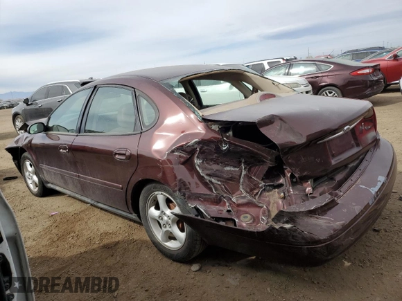 2001 Ford Taurus SES with VIN 1FAFP55S61G184193, listed as a Copart auction lot 49190475 with 129,415 mi miles and Salvage Title. Bid and sale history available at DreamBid. Image 2.
