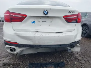 2016 BMW X6 xDrive35i with VIN 5UXKU2C52G0N81395, listed as a IAAI auction lot 41490540 with 149,031 mi miles. Bid and sale history available at carsss.com. Image 17.