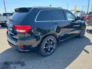 2012 Jeep Grand Cherokee SRT8 with VIN 1C4RJFDJ2CC111226, listed as a Copart auction lot 74449424 with 113,515 mi miles and Clean Title. Bid and sale history available at carsss.com. Image 4.