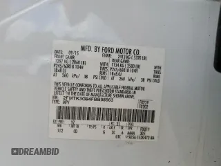 2015 Ford Edge SE with VIN 2FMTK3G94FBB98663, listed as a Copart auction lot 52594845 with 184,775 mi miles and Salvage title. Bid and sale history available at DreamBid. Image 14.