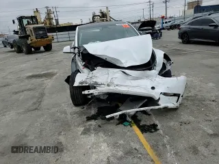 2023 Tesla Model Y Long Range z VIN 7SAYGDEE9PA070232, wystawiony jako Copart lot #55881805 z przebiegiem 38 276 mil mil oraz Szkoda całkowita • Salvage title. Historia ofert i sprzedaży dostępna na DreamBid. Obrazek 13.