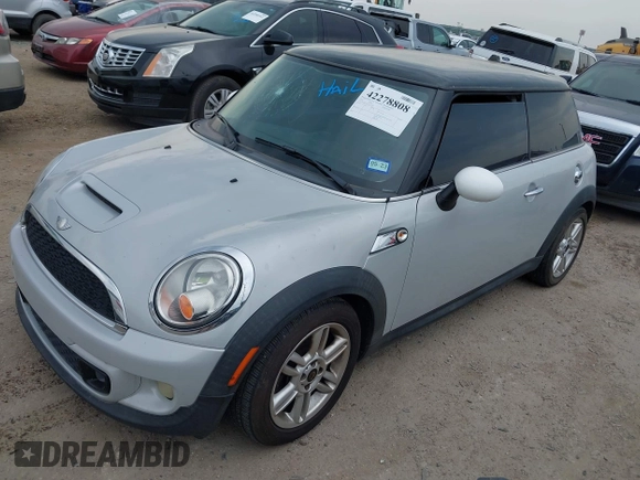 2013 MINI Hardtop S with VIN WMWSV3C5XDT476311, listed as a IAAI auction lot 42278808 with 101,646 mi miles and . Bid and sale history available at DreamBid. Image 2.