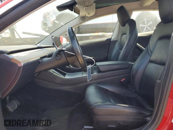 2018 Tesla Model 3 Long Range Battery z VIN 5YJ3E1EA4JF061733, wystawiony jako Copart lot #54885335 z przebiegiem 84 700 mil mil oraz Szkoda całkowita • Salvage title. Historia ofert i sprzedaży dostępna na DreamBid. Obrazek 7.