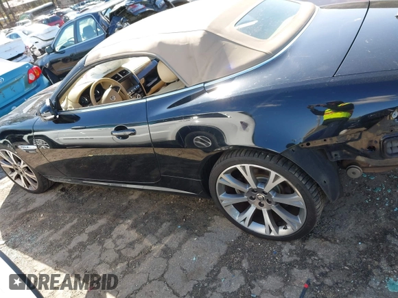 2014 Jaguar XK with VIN SAJWA4GB0ELB52358, listed as a IAAI auction lot 41832850 with 93,037 mi miles. Bid and sale history available at carsss.com. Image 15.