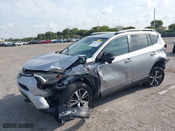 2018 Toyota RAV4 XLE with VIN 2T3WFREV5JW407424, listed as a IAAI auction lot 41869290 with 111,413 mi miles. Bid and sale history available at carsss.com. Image 17.