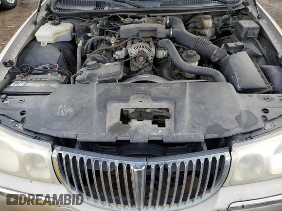 2001 Lincoln Town Car Executive z VIN 1LNHM81W81Y700002, wystawiony jako Copart lot #47018365 z przebiegiem 129 456 mil mil oraz Szkoda całkowita • Salvage title. Historia ofert i sprzedaży dostępna na DreamBid. Obrazek 11.