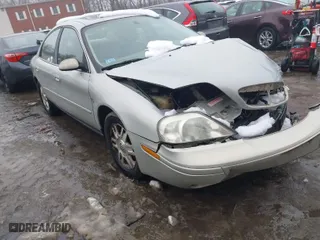 2005 Mercury Sable LS with VIN 1MEFM55S25A631936, listed as a IAAI auction lot 41523450 with 106,472 mi miles. Bid and sale history available at carsss.com. Image 1.