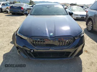 2024 BMW i5 eDrive40 with VIN WBY33FK03RCS14771, listed as a Copart auction lot 62393255 with 25,192 mi miles and Salvage title. Bid and sale history available at DreamBid. Image 5.
