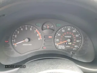 1999 Mitsubishi 3000GT GT z VIN JA3AM84J4XY001608, wystawiony jako Copart lot #64366944 z przebiegiem 153 804 mil mil oraz Tytuł czysty. Historia ofert i sprzedaży dostępna na DreamBid. Obrazek 9.