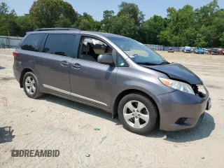 2015 Toyota Sienna LE AAS with VIN 5TDKK3DC9FS637144, listed as a Copart auction lot 59624495 with 151,681 mi miles and Salvage title. Bid and sale history available at DreamBid. Image 4.