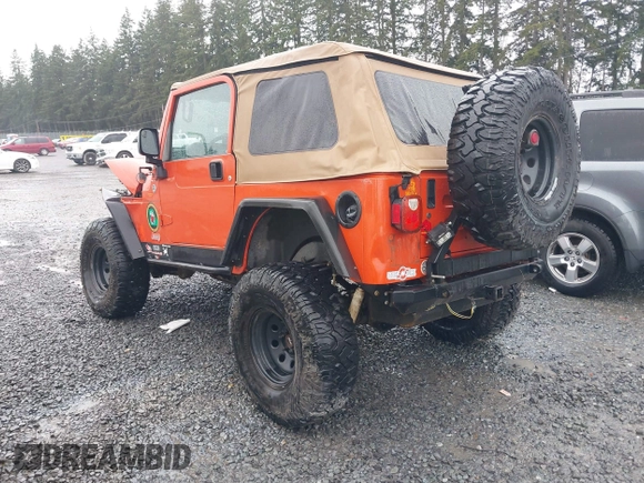 2006 Jeep Wrangler SE with VIN 1J4FA29S46P738370, listed as a IAAI auction lot 41825273 with 163,267 mi miles. Bid and sale history available at carsss.com. Image 3.