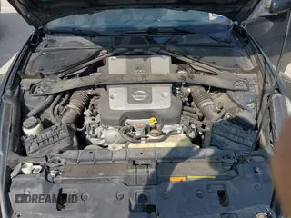 2015 Nissan 370Z z VIN JN1AZ4EH2FM442556, wystawiony jako IAAI lot #41956287 z przebiegiem 128 769 mil mil oraz . Historia ofert i sprzedaży dostępna na DreamBid. Obrazek 10.