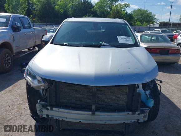 2020 Chevrolet Traverse LT Cloth z VIN 1GNERGKW3LJ177069, wystawiony jako IAAI lot #42080588 z przebiegiem 91 630 mil mil oraz . Historia ofert i sprzedaży dostępna na DreamBid. Obrazek 13.