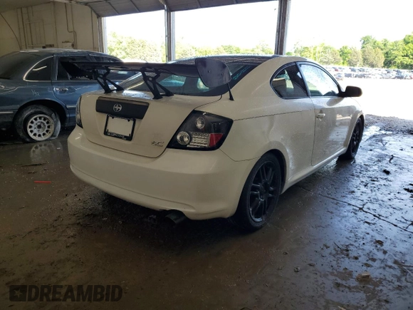 2005 Scion tC z VIN JTKDE177650011368, wystawiony jako Copart lot #56408015 z przebiegiem 165 731 mil mil oraz Szkoda całkowita • Salvage title. Historia ofert i sprzedaży dostępna na DreamBid. Obrazek 3.