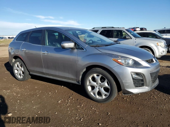 2011 Mazda CX-7 S Grand Touring z VIN JM3ER4D32B0379567, wystawiony jako Copart lot #79163864 z przebiegiem 142 292 mil mil oraz Czysty tytuł • Clean title. Historia ofert i sprzedaży dostępna na DreamBid. Obrazek 4.