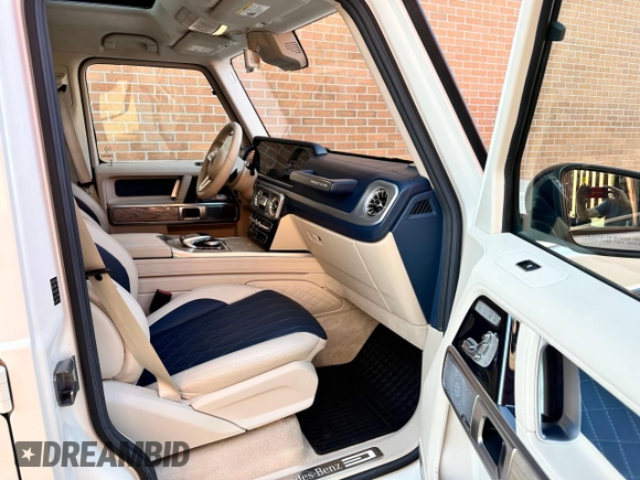 2020 Mercedes-Benz G 550 z VIN W1NYC6BJ3LX340654, wystawiony jako Copart lot #78332104 z przebiegiem 44 015 mil mil oraz Nie do naprawy. Historia ofert i sprzedaży dostępna na DreamBid. Obrazek 7.