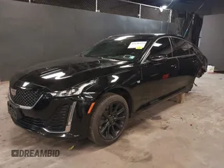 2023 Cadillac CT5 Luxury z VIN 1G6DX5RK7P0135813, wystawiony jako IAAI lot #42130722 z przebiegiem 20 738 mil mil oraz . Historia ofert i sprzedaży dostępna na DreamBid. Obrazek 2.