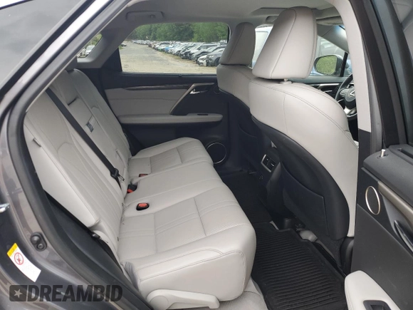 2016 Lexus RX 450h z VIN 2T2BGMCA0GC001306, wystawiony jako Copart lot #57262465 z przebiegiem 50 891 mil mil oraz Szkoda całkowita • Salvage title. Historia ofert i sprzedaży dostępna na DreamBid. Obrazek 11.