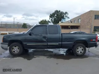 2003 Chevrolet Silverado 1500 LS with VIN 1GCEK19TX3E107860, listed as a IAAI auction lot 41461401 with 379,055 mi miles. Bid and sale history available at carsss.com. Image 14.