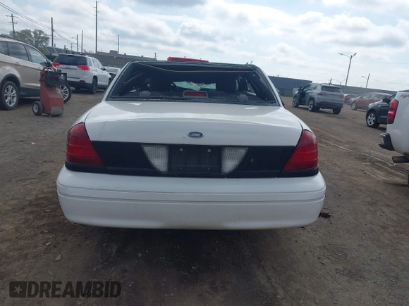 2008 Ford Police Interceptor z VIN 2FAFP71V68X141764, wystawiony jako IAAI lot #42268723 z przebiegiem Nie podano mil oraz . Historia ofert i sprzedaży dostępna na DreamBid. Obrazek 15.