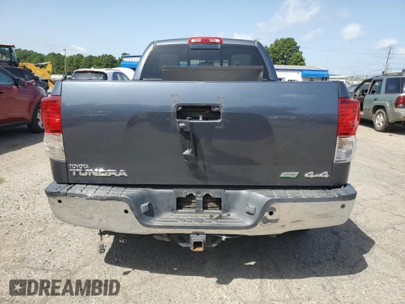 2010 Toyota Tundra with VIN 5TFUW5F10AX110293, listed as a Copart auction lot 64685105 with 256,875 mi miles and Salvage title. Bid and sale history available at DreamBid. Image 6.