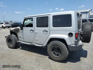 2011 Jeep Wrangler Unlimited Sahara with VIN 1J4BA5H14BL613895, listed as a Copart auction lot 65171404 with 0 mi miles and Non Repairable. Bid and sale history available at carsss.com. Image 2.