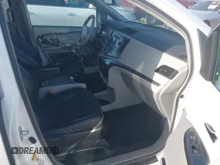 2012 Toyota Sienna SE with VIN 5TDXK3DC1CS221798, listed as a IAAI auction lot 41989210 with 198,962 mi miles. Bid and sale history available at carsss.com. Image 5.