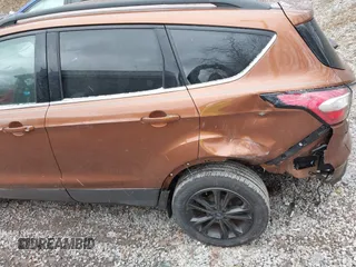 2017 Ford Escape SE with VIN 1FMCU9G96HUC12475, listed as a IAAI auction lot 41741342 with 102,823 mi miles. Bid and sale history available at carsss.com. Image 6.