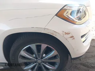 2014 Mercedes-Benz GL 450 with VIN 4JGDF7CE3EA336481, listed as a IAAI auction lot 42025576 with 145,244 mi miles and . Bid and sale history available at DreamBid. Image 6.