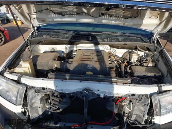 2012 Toyota Tundra 4WD Truck with VIN 5TFDW5F10CX241968, listed as a IAAI auction lot 41858300 with 272,634 mi miles. Bid and sale history available at carsss.com. Image 10.