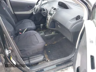 2010 Toyota Yaris with VIN JTDKT4K35A5280923, listed as a IAAI auction lot 41270556 with 175,643 mi miles. Bid and sale history available at carsss.com. Image 5.