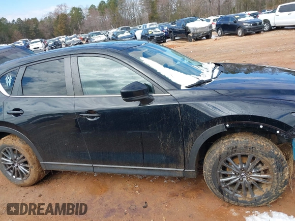 2020 Mazda CX-5 Touring z VIN JM3KFBCMXL1741182, wystawiony jako IAAI lot #41602315 z przebiegiem 31 582 mil mil oraz . Historia ofert i sprzedaży dostępna na DreamBid. Obrazek 14.