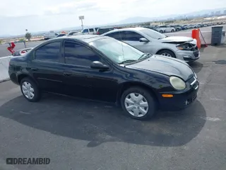 2004 Dodge Neon SXT with VIN 1B3ES56C44D527117, listed as a IAAI auction lot 42077644 with 162,017 mi miles. Bid and sale history available at carsss.com. Image 1.