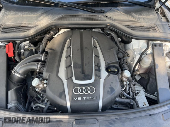 2017 Audi A8 Sport z VIN WAU43AFD7HN005619, wystawiony jako Copart lot #57526015 z przebiegiem 57 262 mil mil oraz Szkoda całkowita • Salvage title. Historia ofert i sprzedaży dostępna na DreamBid. Obrazek 7.