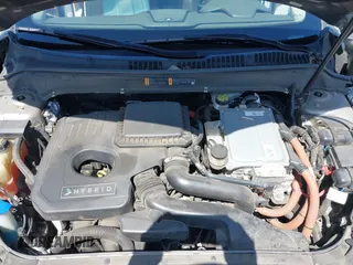 2016 Lincoln MKZ Hybrid with VIN 3LN6L2LU8GR613310, listed as a IAAI auction lot 41986892 with 114,087 mi miles. Bid and sale history available at carsss.com. Image 10.