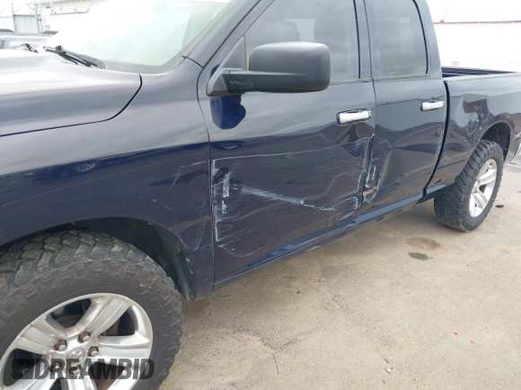 2015 Ram 1500 Outdoorsman z VIN 1C6RR7GT6FS508211, wystawiony jako IAAI lot #42044889 z przebiegiem 125 774 mil mil oraz . Historia ofert i sprzedaży dostępna na DreamBid. Obrazek 6.