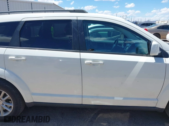 2017 Dodge Journey SXT z VIN 3C4PDDBG7HT512776, wystawiony jako IAAI lot #41967109 z przebiegiem 109 747 mil mil oraz . Historia ofert i sprzedaży dostępna na DreamBid. Obrazek 13.